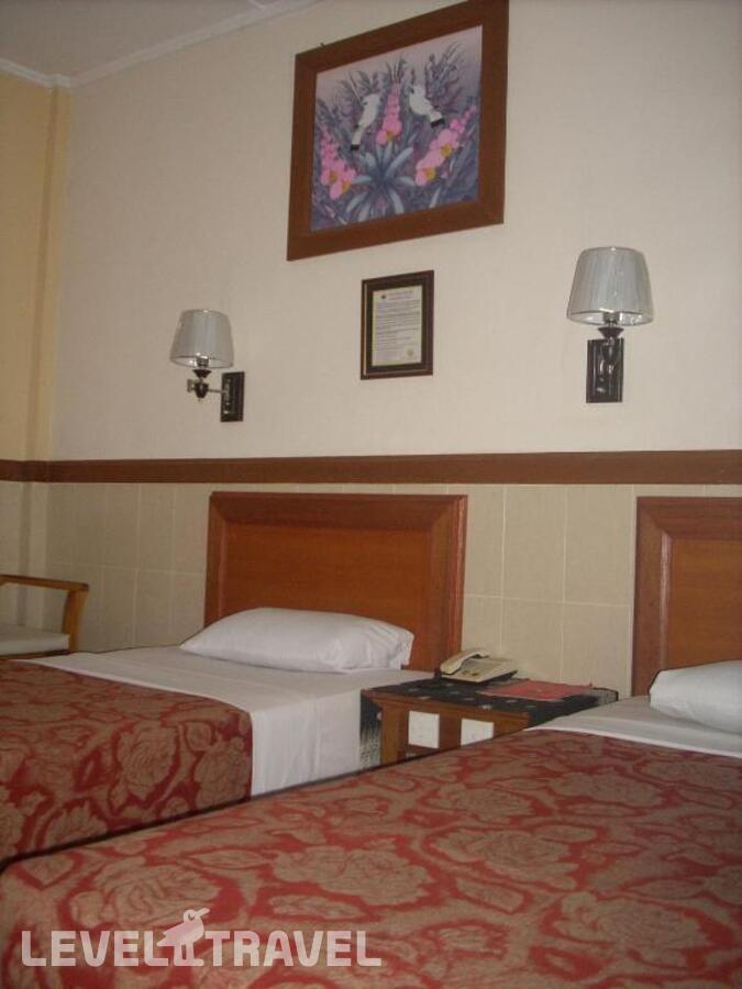 фотографии номера Стандартный (две односпальные кровати) отеля Hotel Sorga Cottages в Индонезия(Кута) - фото №2