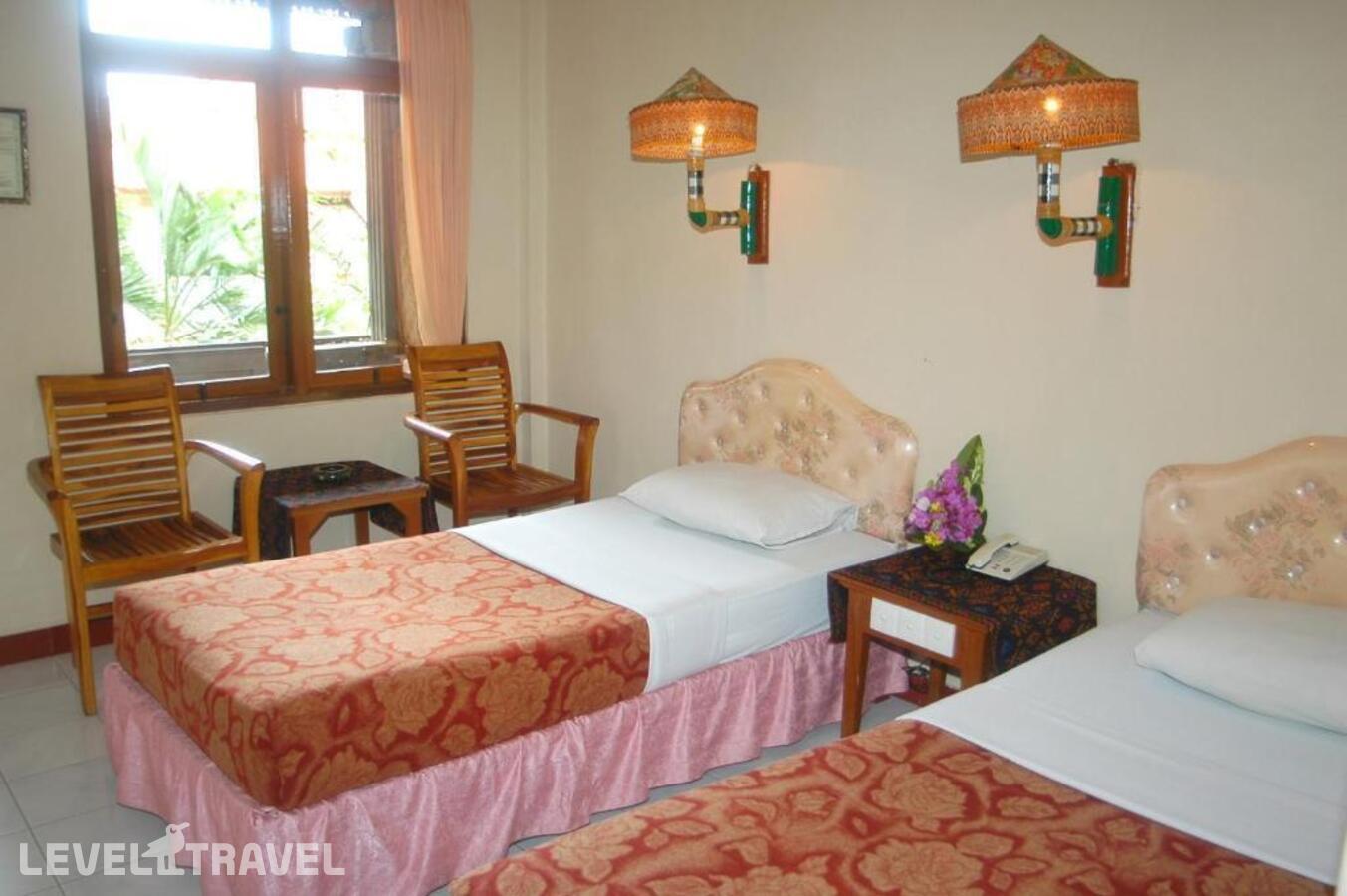 фотографии номера Стандартный (две односпальные кровати) отеля Hotel Sorga Cottages в Индонезия(Кута) - фото №3