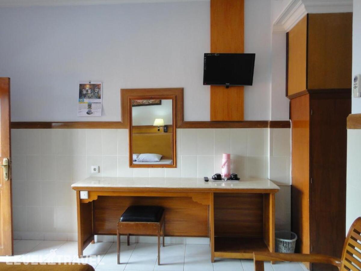 фотографии номера Делюкс отеля Hotel Sorga Cottages в Индонезия(Кута) - фото №2