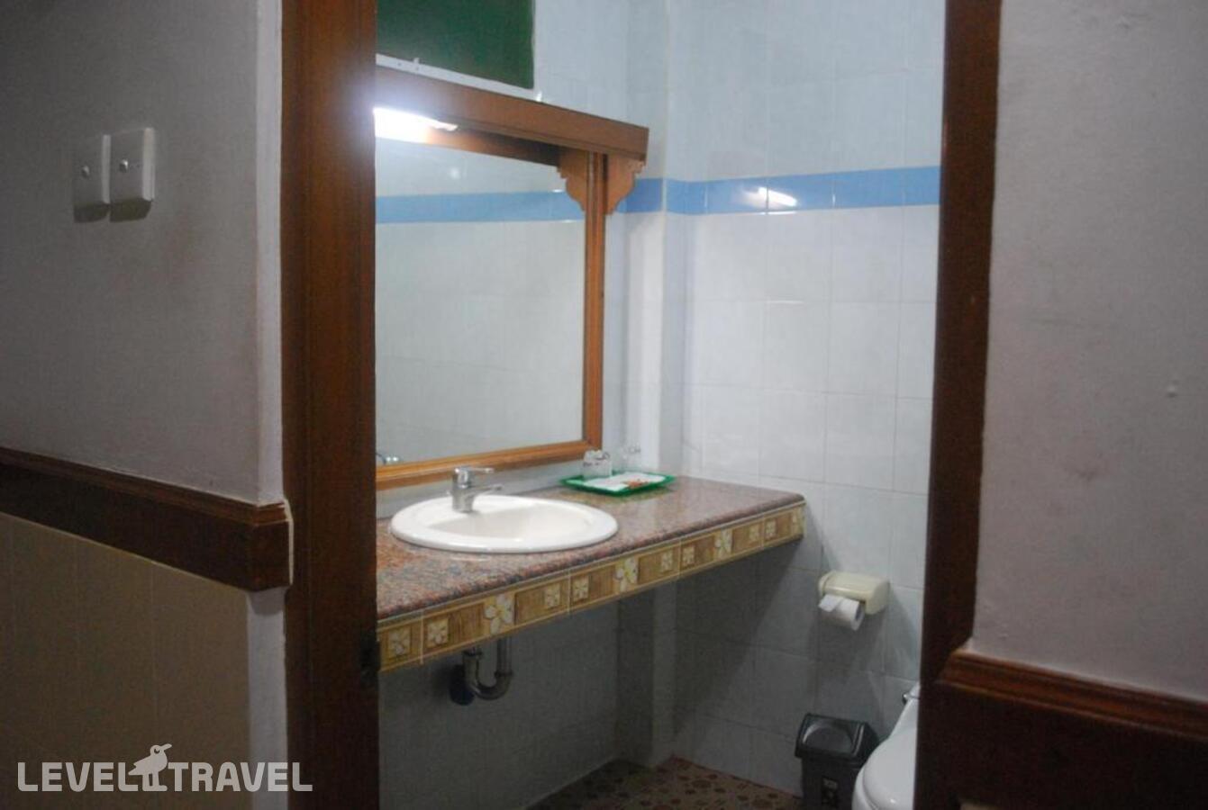 фотографии номера Делюкс (две односпальные кровати) отеля Hotel Sorga Cottages в Индонезия(Кута) - фото №6