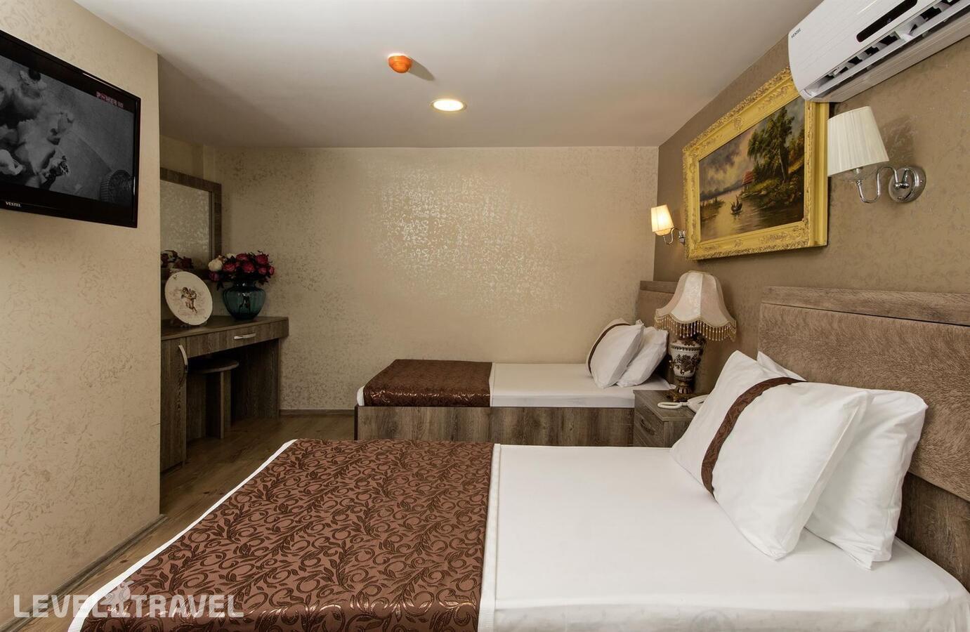 фотографии номера Стандартный (две односпальные кровати) отеля Carvan Hotel в Турция(Фатих) - фото №2