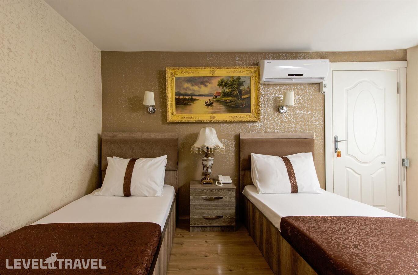 фотографии номера Стандартный (две односпальные кровати) отеля Carvan Hotel в Турция(Фатих) - фото №1