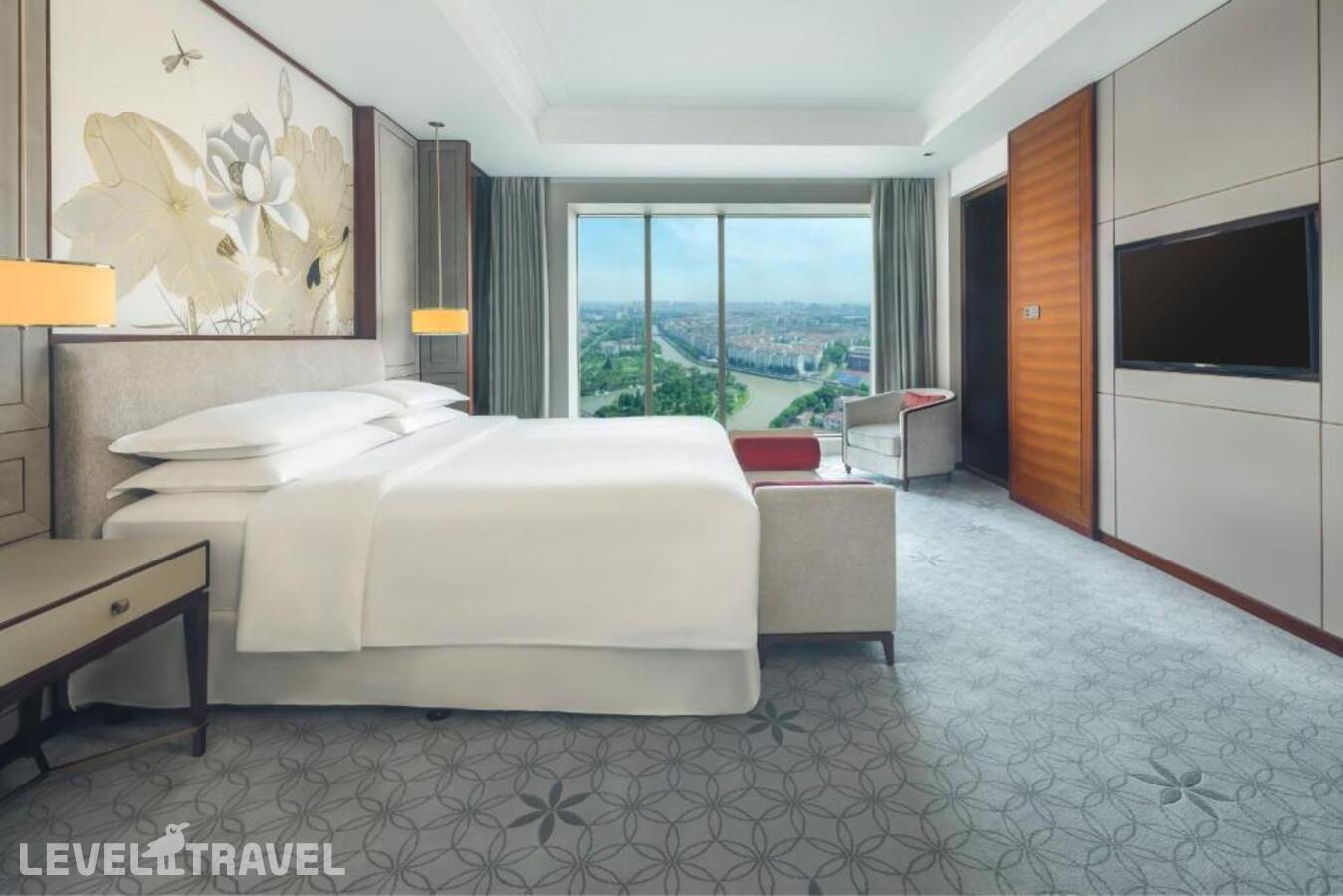 фотографии номера Двухместный клубный полулюкс двуспальная кровать отеля Sheraton Shanghai Jiading Hotel в Китай(Шанхай) - фото №2
