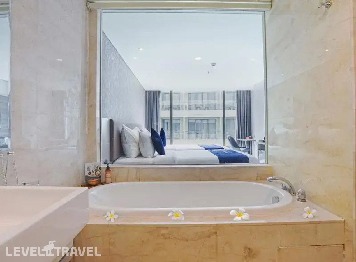 фотографии номера Номер бизнес (две односпальные кровати) отеля Platinum Hotel Jimbaran в Индонезия(Кедонганан) - фото №1
