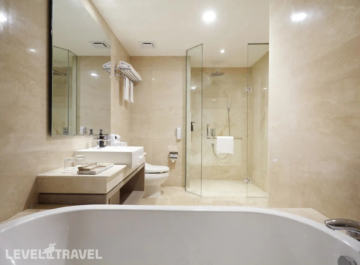 фотографии номера Делюкс (две односпальные кровати) отеля Platinum Hotel Jimbaran в Индонезия(Кедонганан) - фото №6