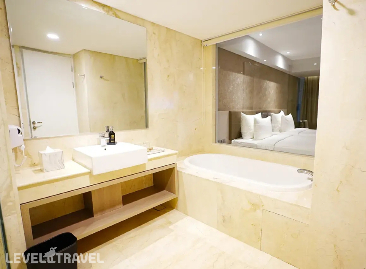 фотографии номера Делюкс (две односпальные кровати) отеля Platinum Hotel Jimbaran в Индонезия(Кедонганан) - фото №5