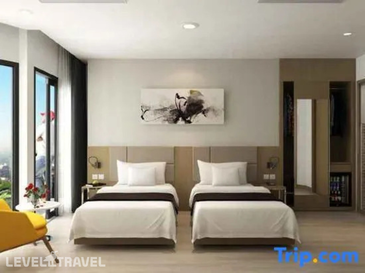 фотографии номера Номер Deluxe с балконом и с частичным видом на море отеля Nalicas Hotel в Вьетнам(Нячанг) - фото №7