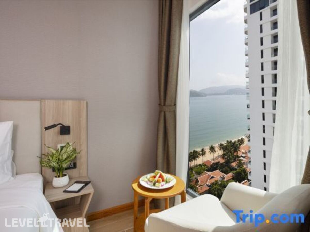 фотографии номера Номер Deluxe с балконом и с частичным видом на море отеля Nalicas Hotel в Вьетнам(Нячанг) - фото №8