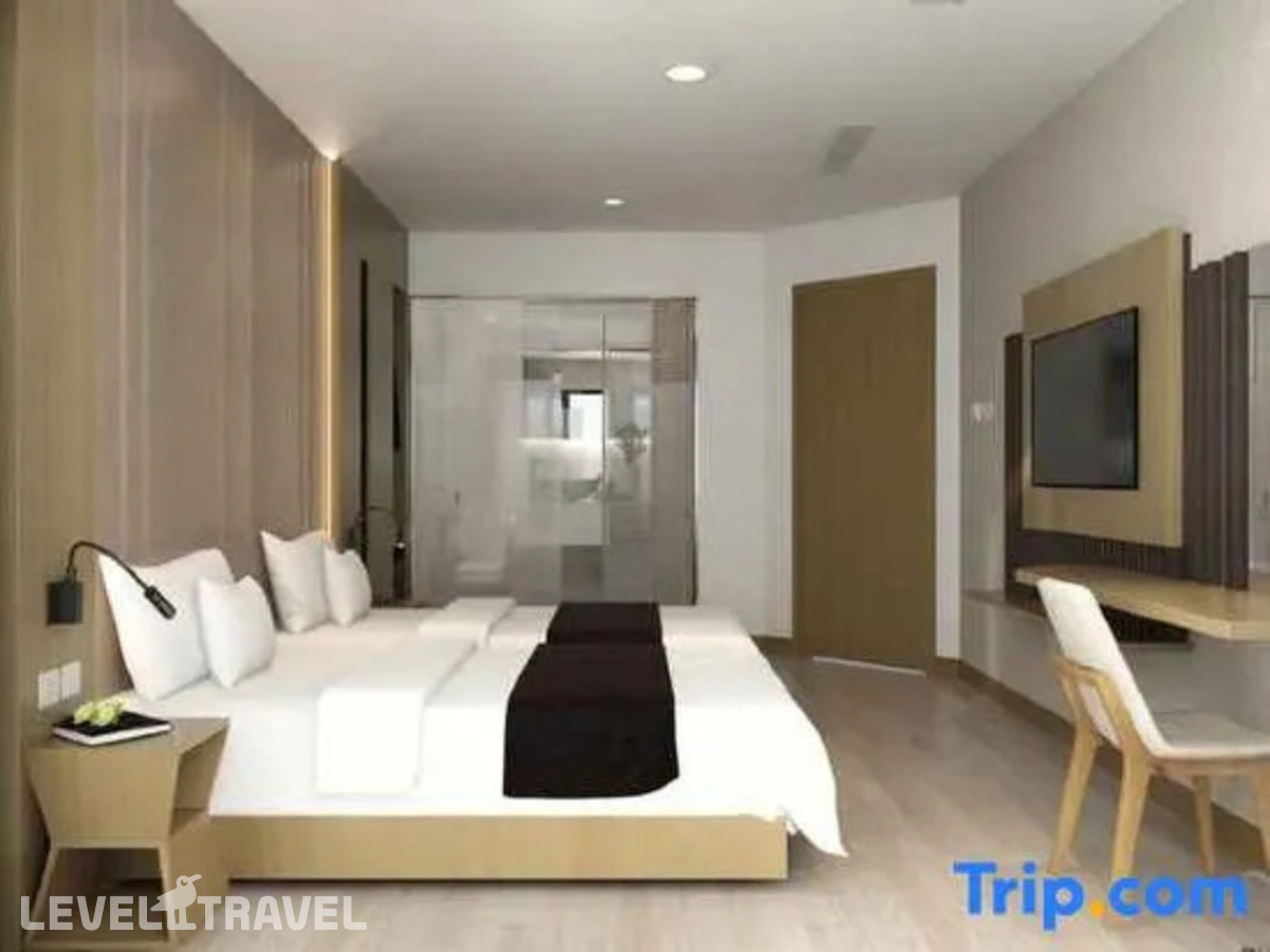 фотографии номера Номер Deluxe с балконом и с частичным видом на море отеля Nalicas Hotel в Вьетнам(Нячанг) - фото №9