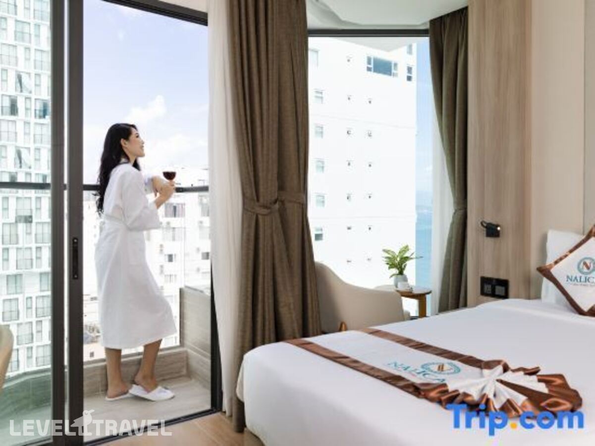 фотографии номера Номер Deluxe с балконом и с частичным видом на море отеля Nalicas Hotel в Вьетнам(Нячанг) - фото №6