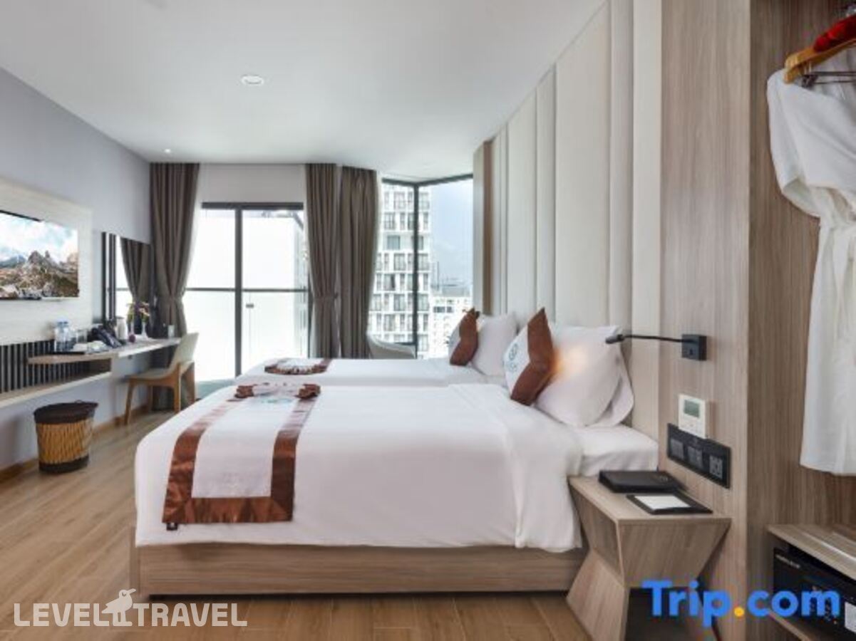 фотографии номера Номер Deluxe с балконом и с частичным видом на море отеля Nalicas Hotel в Вьетнам(Нячанг) - фото №4