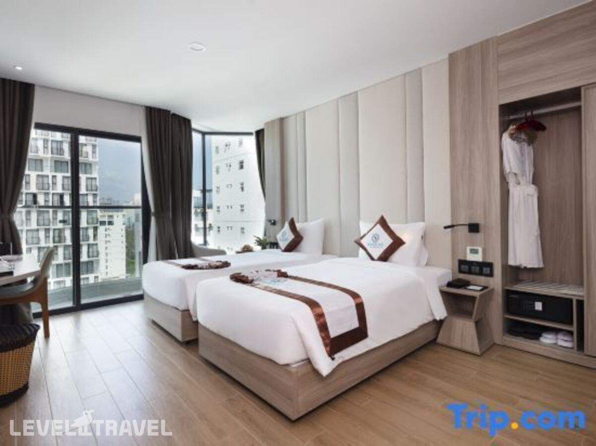 фотографии номера Номер Deluxe с балконом и с частичным видом на море отеля Nalicas Hotel в Вьетнам(Нячанг) - фото №17