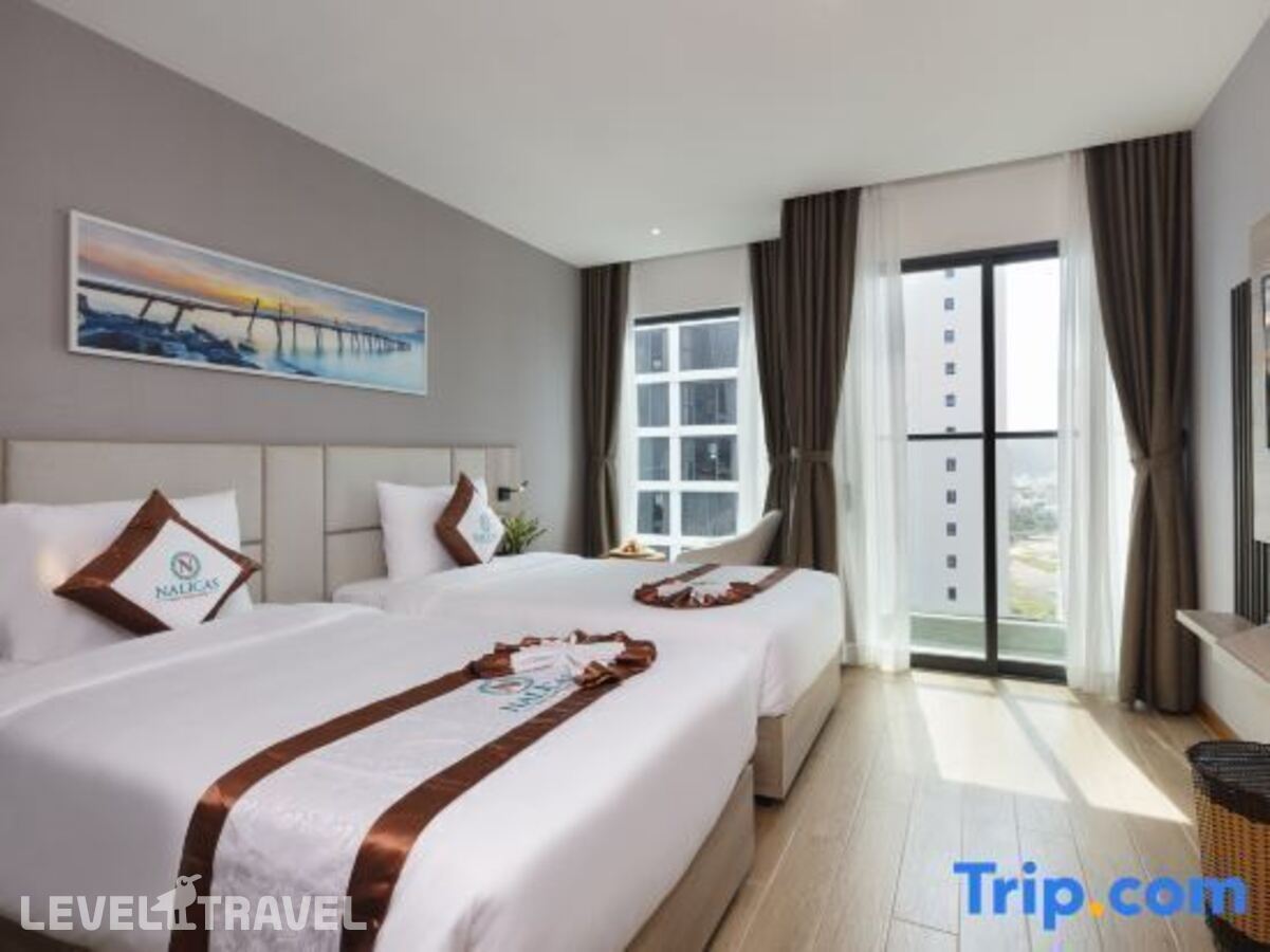 фотографии номера Номер Deluxe с балконом и с частичным видом на море отеля Nalicas Hotel в Вьетнам(Нячанг) - фото №10