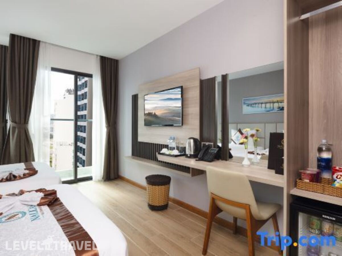 фотографии номера Номер Deluxe с балконом и с частичным видом на море отеля Nalicas Hotel в Вьетнам(Нячанг) - фото №2
