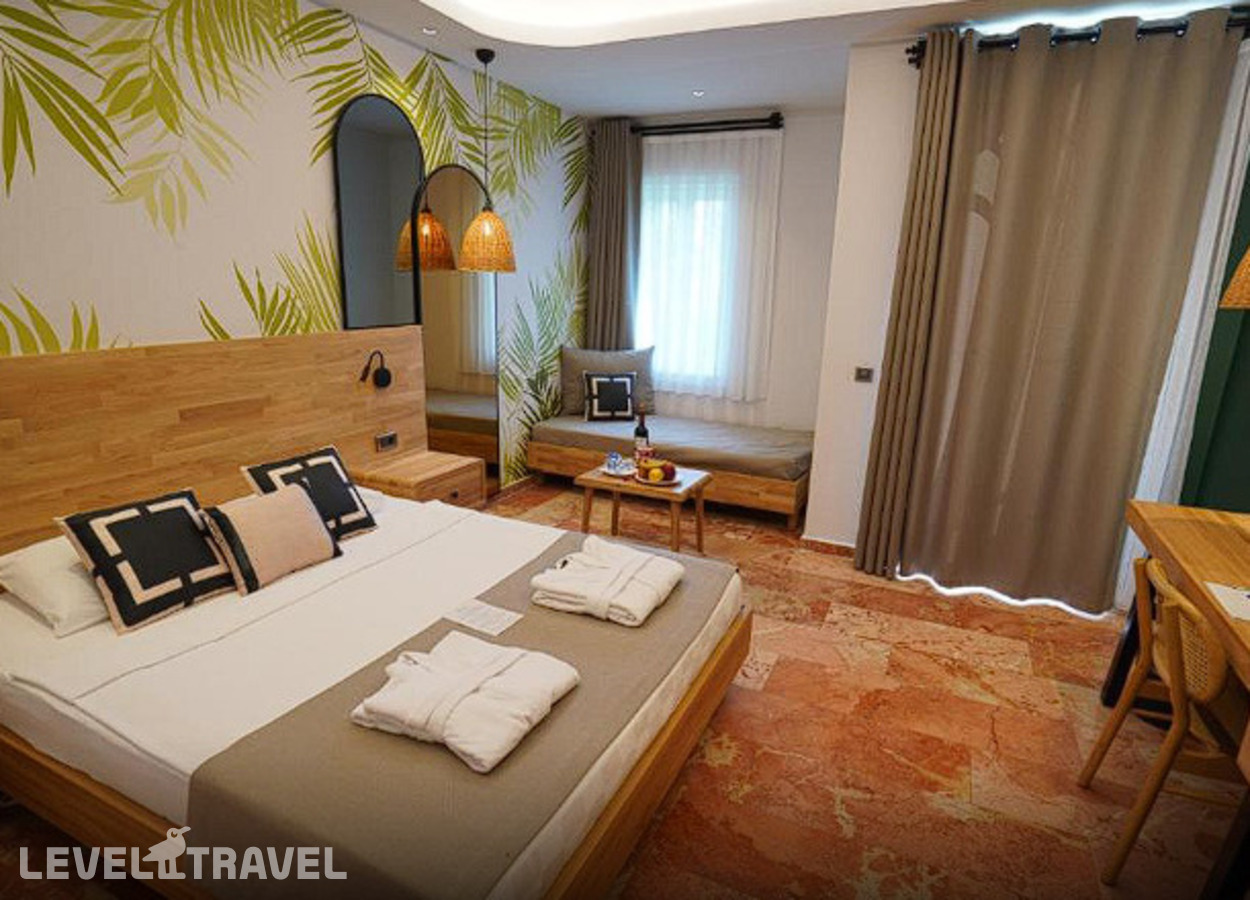 фотографии номера Семейный делюкс с видом на сад отеля Tuana Club Fethiye (Ex. Majesty Club Tuana) в Турция(Яныклар) - фото №6