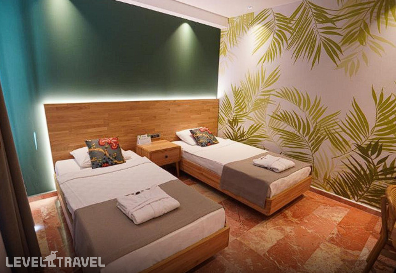 фотографии номера Семейный делюкс с видом на сад отеля Tuana Club Fethiye (Ex. Majesty Club Tuana) в Турция(Яныклар) - фото №7