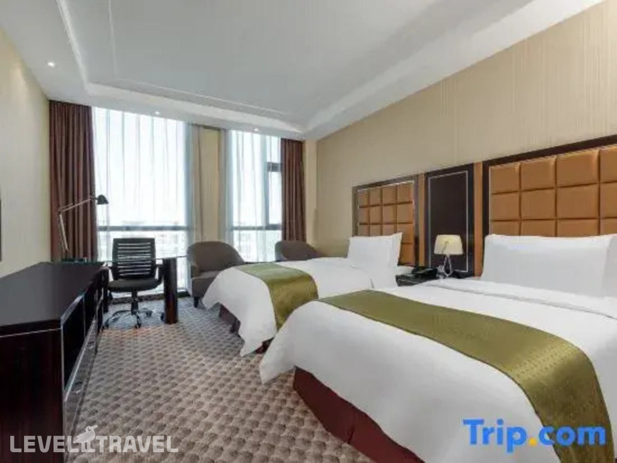 фотографии номера Делюкс (две односпальные кровати) отеля Holiday Inn Beijing Airport Zone, An Ihg Hotel в Китай(Пекин) - фото №1