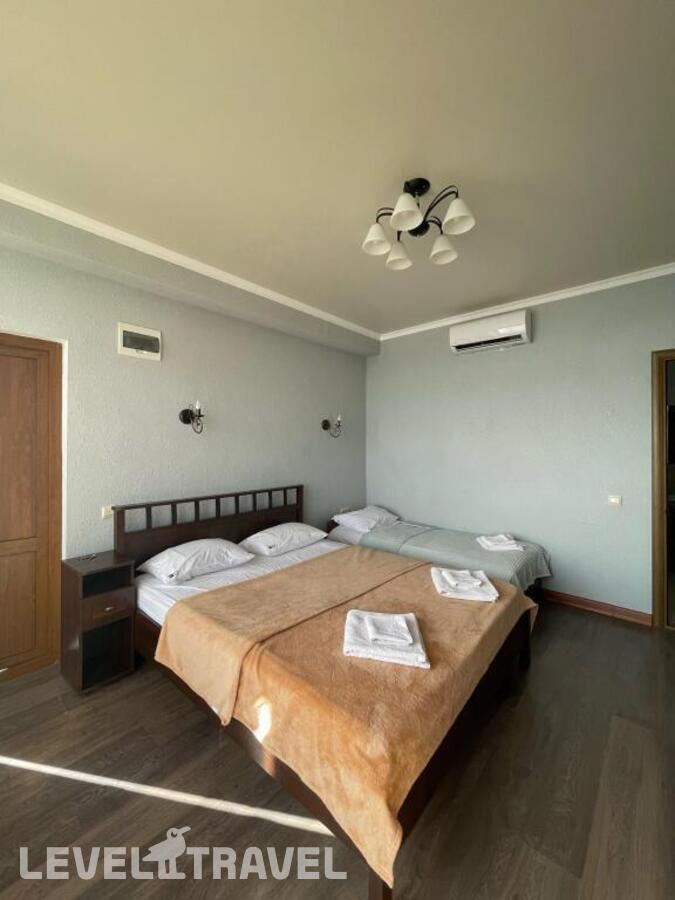 Трёхместный номер Deluxe с балконом и с видом на море — фото 4