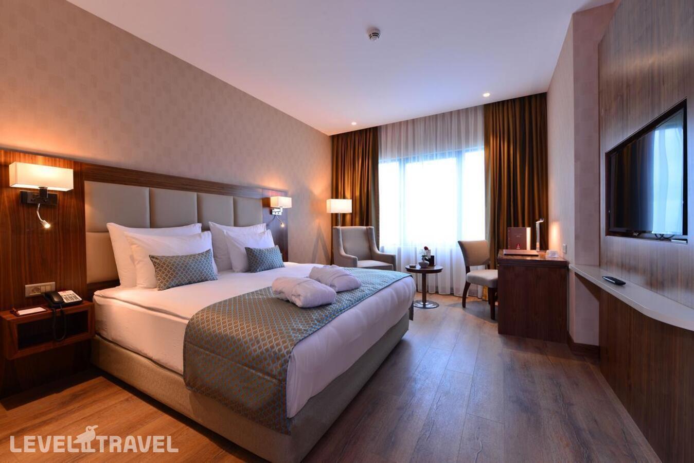 фотографии номера Номер Бизнес отеля Clarion Hotel Istanbul Mahmutbey в Турция(Багджылар) - фото №4