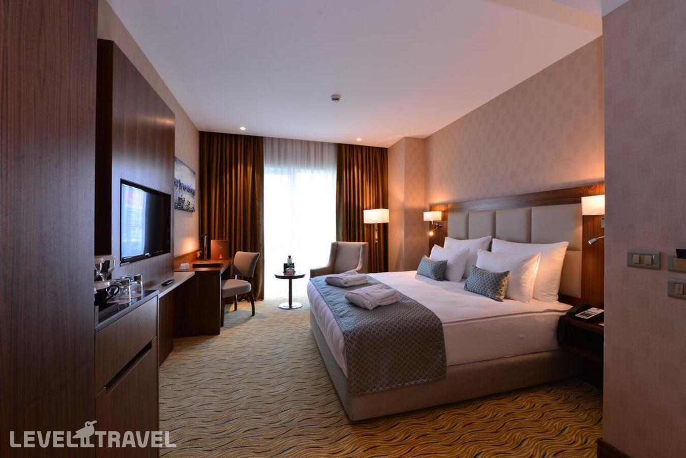 фотографии номера Номер Бизнес отеля Clarion Hotel Istanbul Mahmutbey в Турция(Багджылар) - фото №3