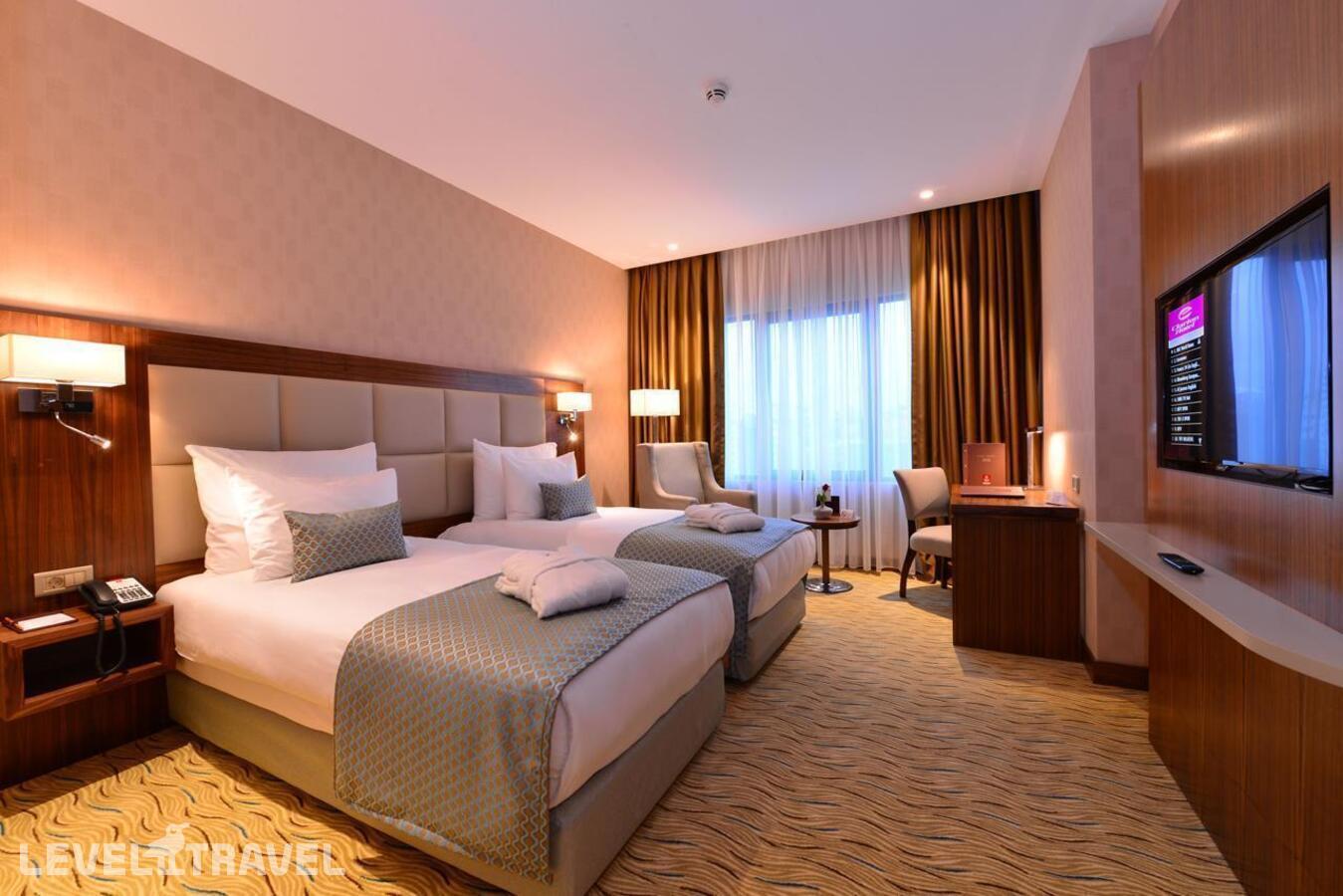 фотографии номера Номер Бизнес отеля Clarion Hotel Istanbul Mahmutbey в Турция(Багджылар) - фото №5