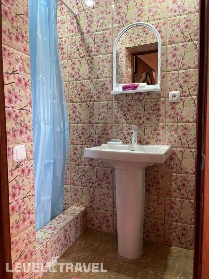 фотографии номера Четырехместный улучшенный с балконом отеля Гостевой Дом Сан-Мария в Абхазия(Сухум) - фото №5