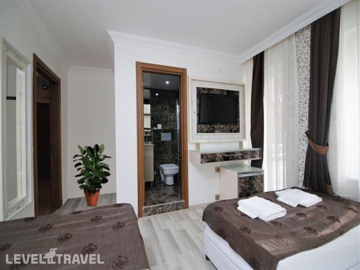 фотографии номера Стандартный номер отеля Behram Hotel в Турция(Коньяалты) - фото №5