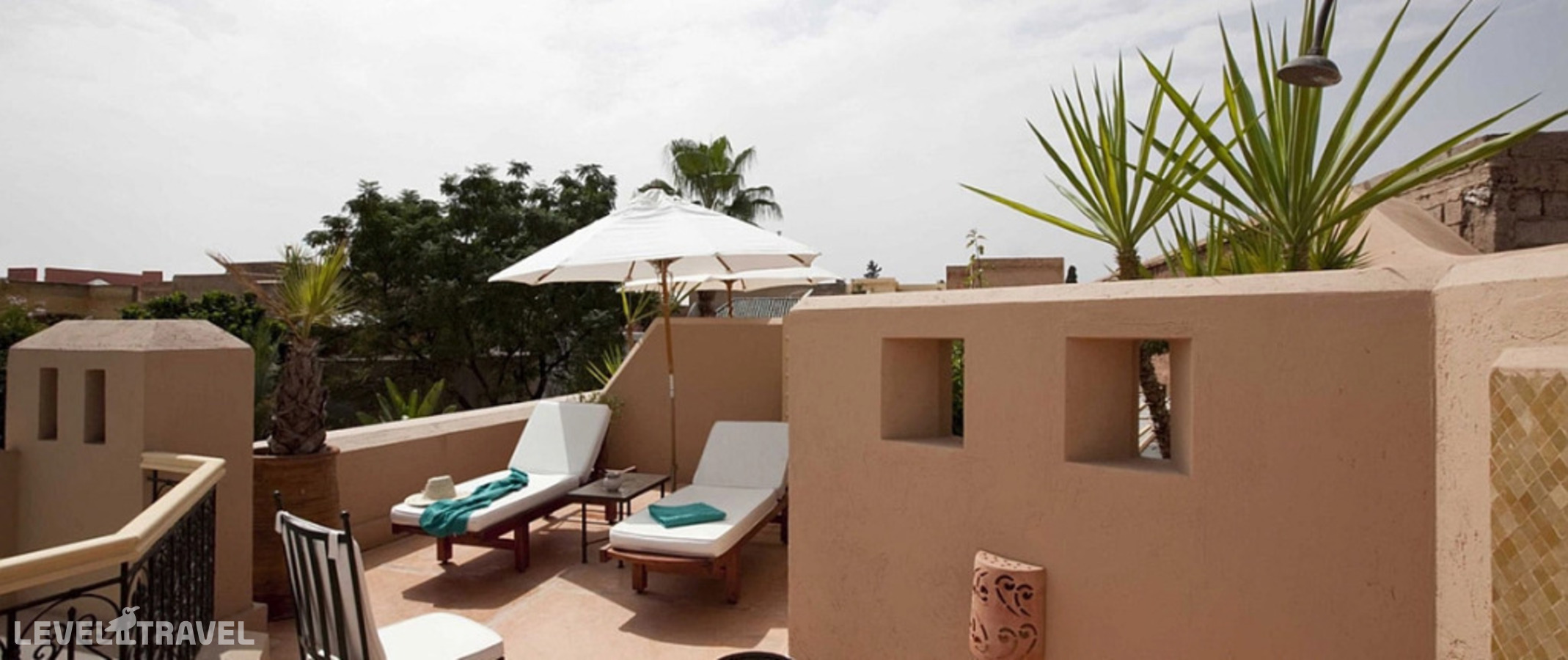 фотографии номера Двухместный номер Solarium двуспальная кровать отеля Les Jardins De La Medina в Марокко(Марракеш) - фото №3