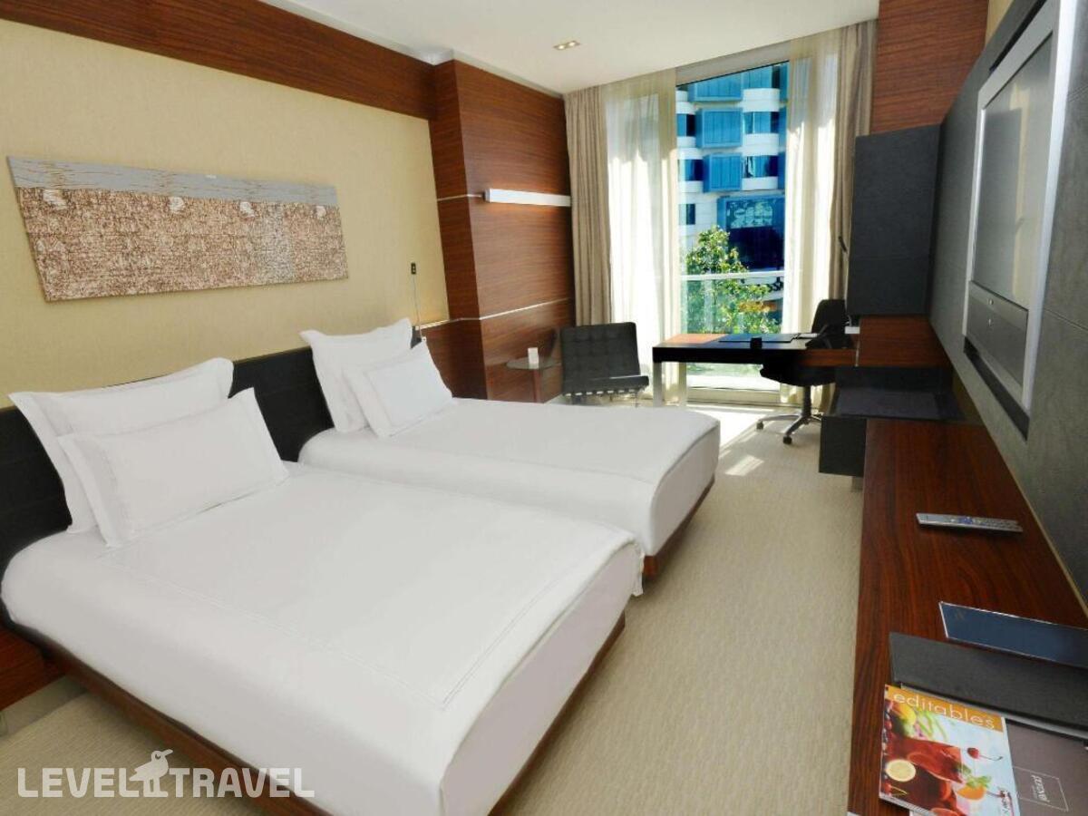 фотографии номера Стандартный с видом на сад (две односпальные кровати) отеля Swissotel Buyuk Efes Izmir в Турция(Измир) - фото №1