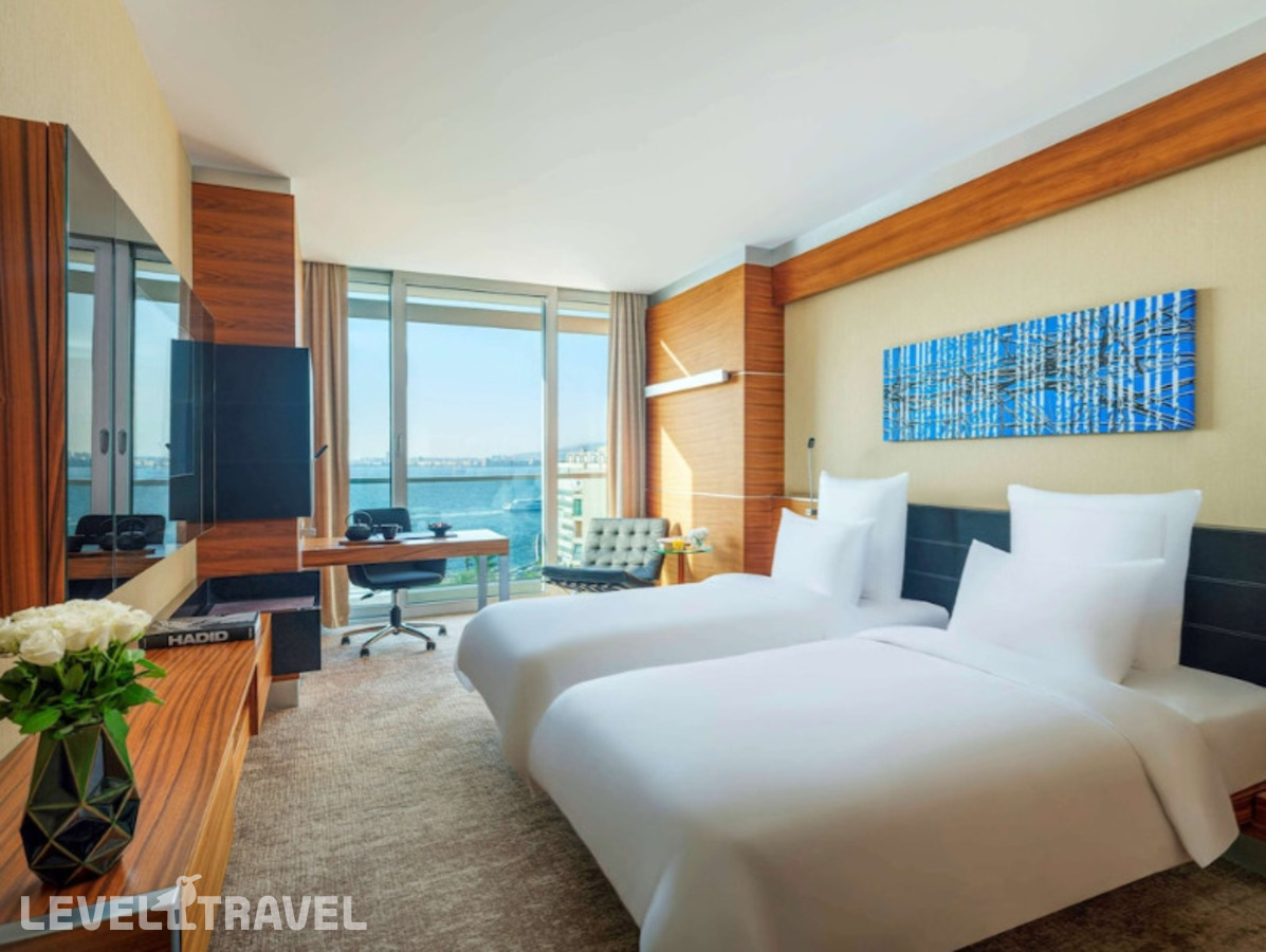 фотографии номера Номер Swiss Advantage с видом на море отеля Swissotel Buyuk Efes Izmir в Турция(Измир) - фото №1