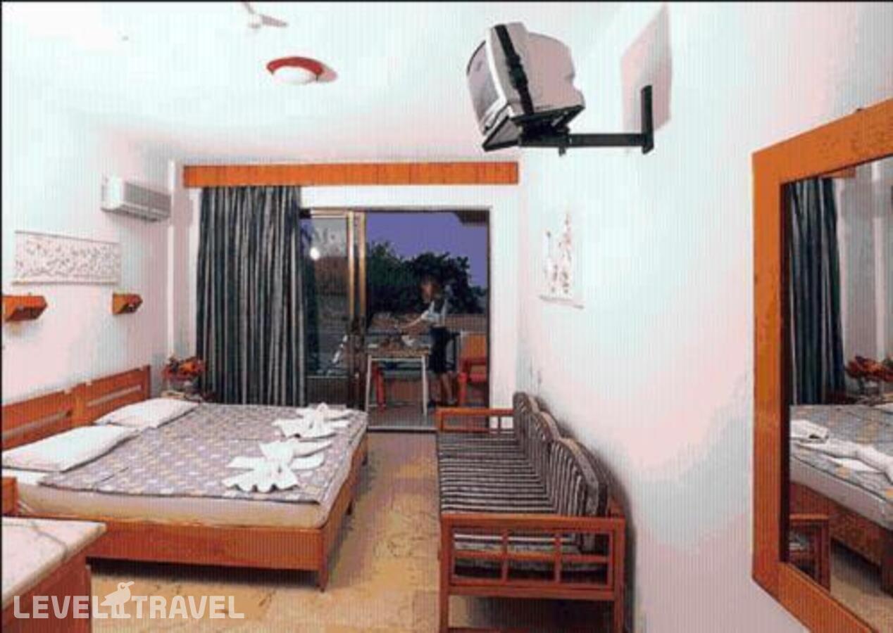 фотографии номера Семейный номер Standard Дуплекс с видом на сад отеля Tropic On The Beach Hotel в Турция(Сиде - центр) - фото №1