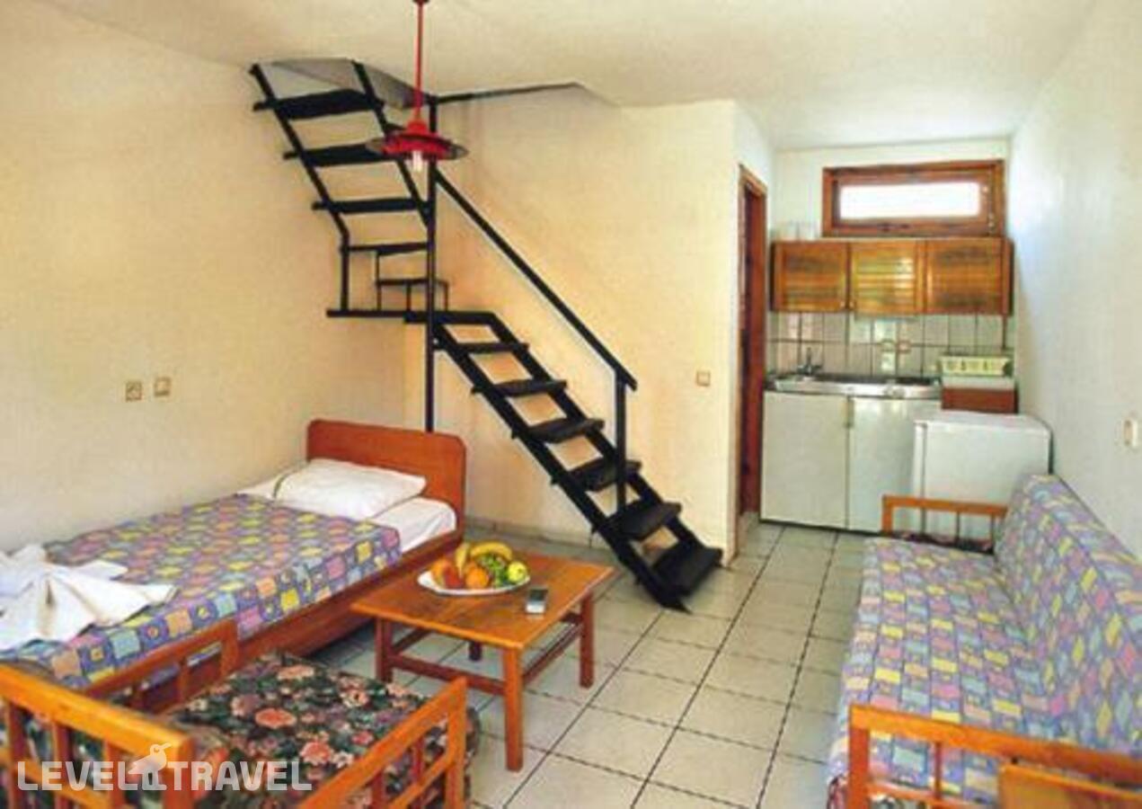 фотографии номера Семейный номер Standard Дуплекс с видом на сад отеля Tropic On The Beach Hotel в Турция(Сиде - центр) - фото №4