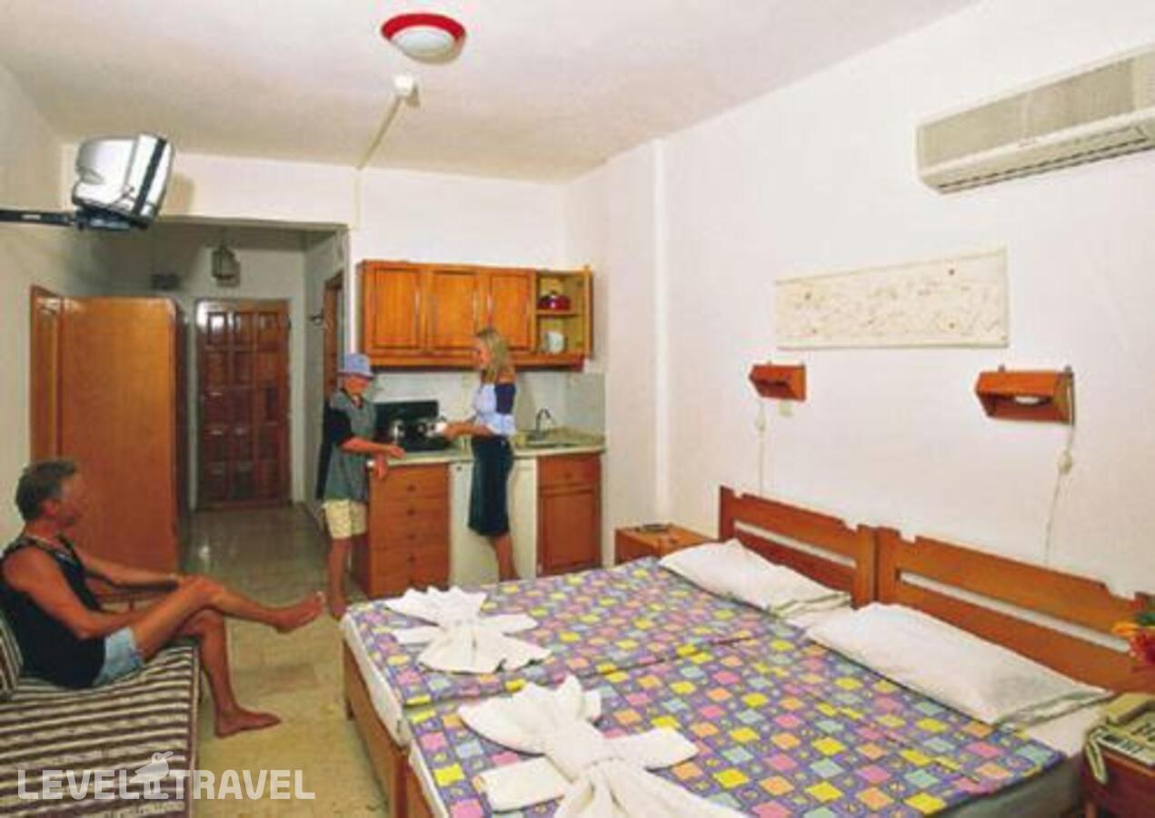 фотографии номера Семейный номер Standard Дуплекс с видом на сад отеля Tropic On The Beach Hotel в Турция(Сиде - центр) - фото №3