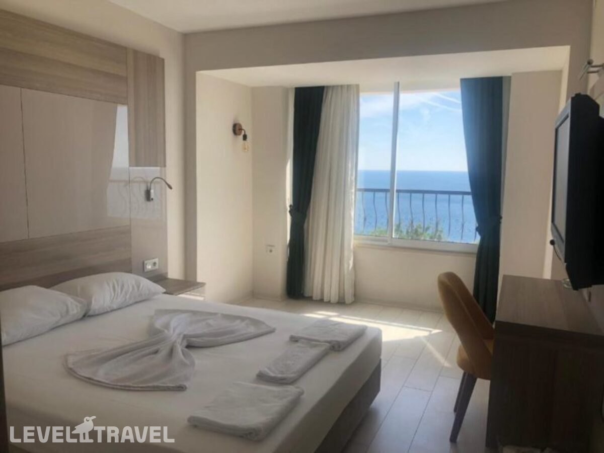фотографии номера Стандартный с видом на море отеля Upon Hotel в Турция(Лара) - фото №1