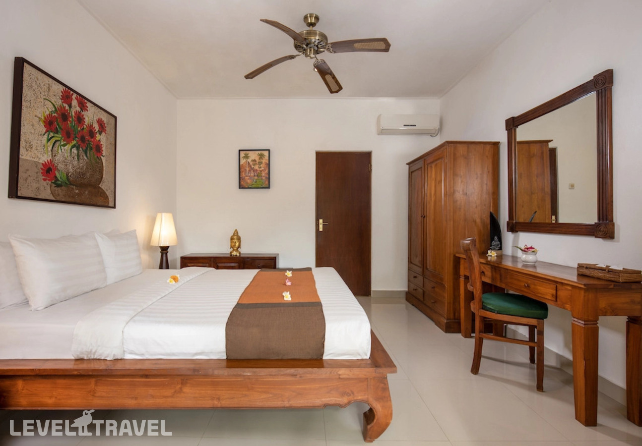фотографии номера Двухместный номер Losmen двуспальная кровать отеля Alam Anda Ocean Front Resort & Spa в Индонезия(Теджакула) - фото №2