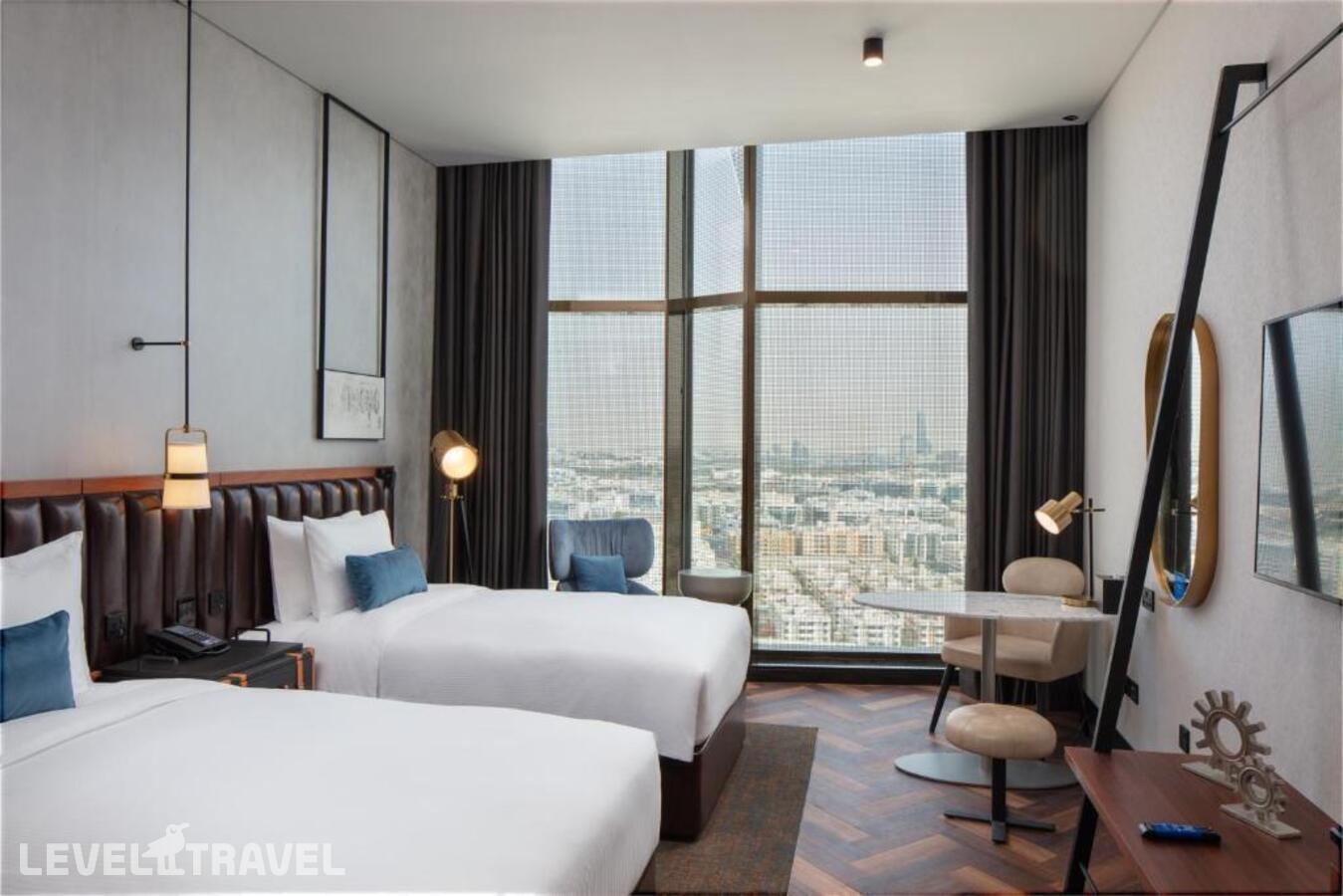 фотографии номера Делюкс отеля Doubletree By Hilton Dubai M Square Hotel & Residences в ОАЭ(Бар Дубай) - фото №2