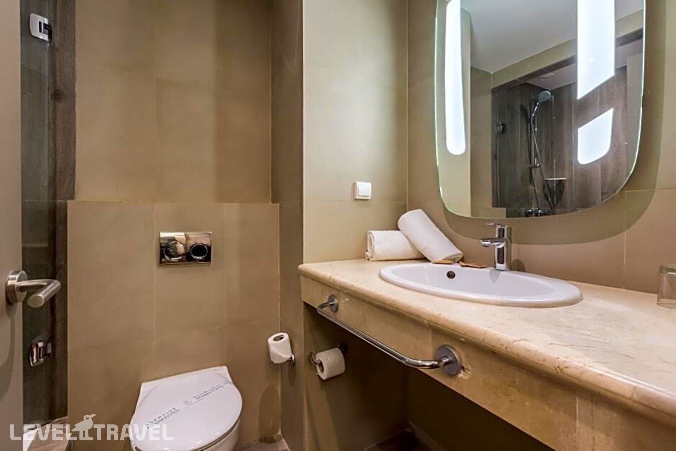 фотографии номера Стандартный с видом на сад (две односпальные кровати) отеля Hotel Ibis Marrakech Centre Gare в Марокко(Марракеш) - фото №6