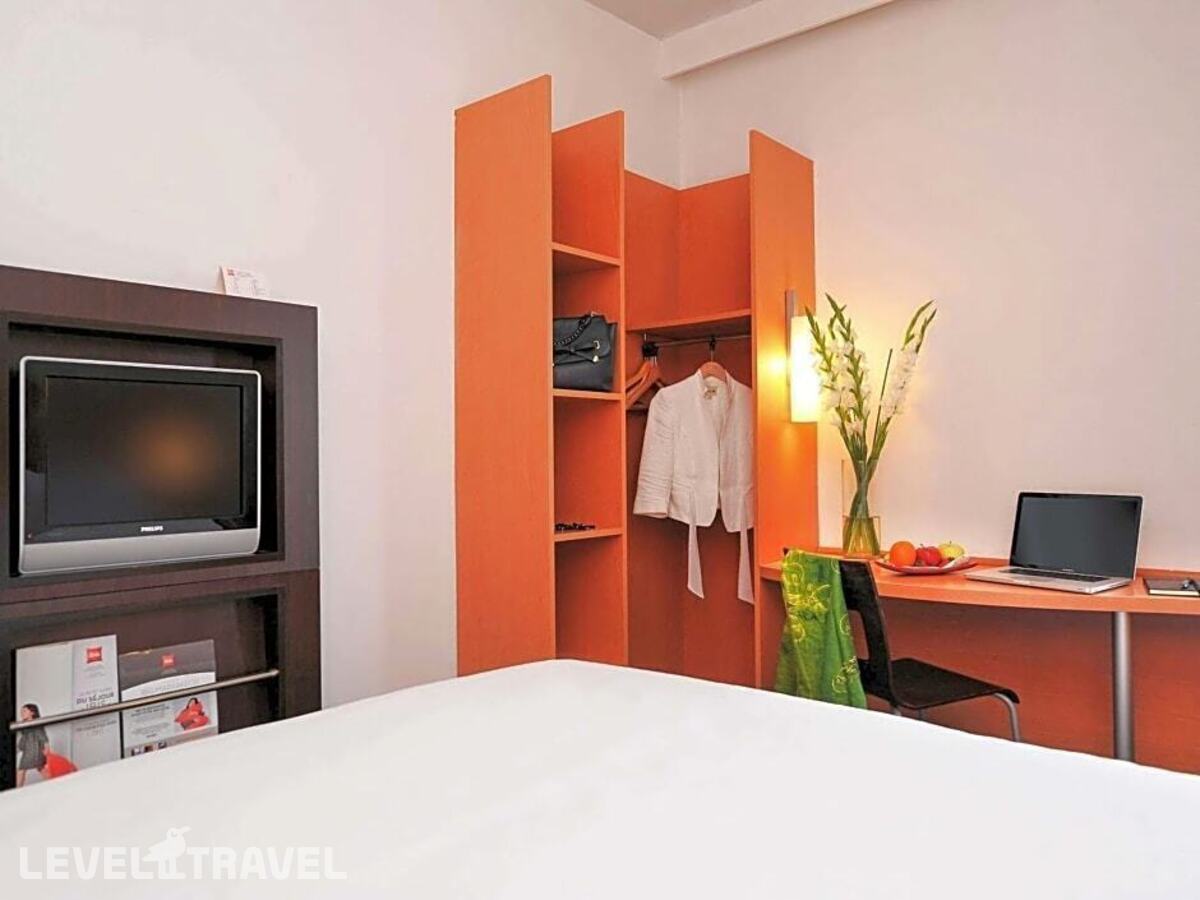 фотографии номера Стандартный с видом на сад (две односпальные кровати) отеля Hotel Ibis Marrakech Centre Gare в Марокко(Марракеш) - фото №3