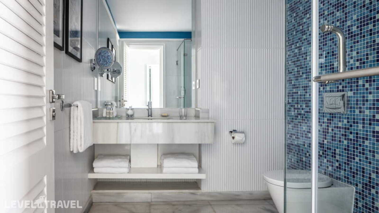 фотографии номера Двухместные Beach Suite Deluxe c 1 спальней двуспальная кровать отеля Four Seasons Hotel Alexandria At San Stefano в Египет(Александрия) - фото №4