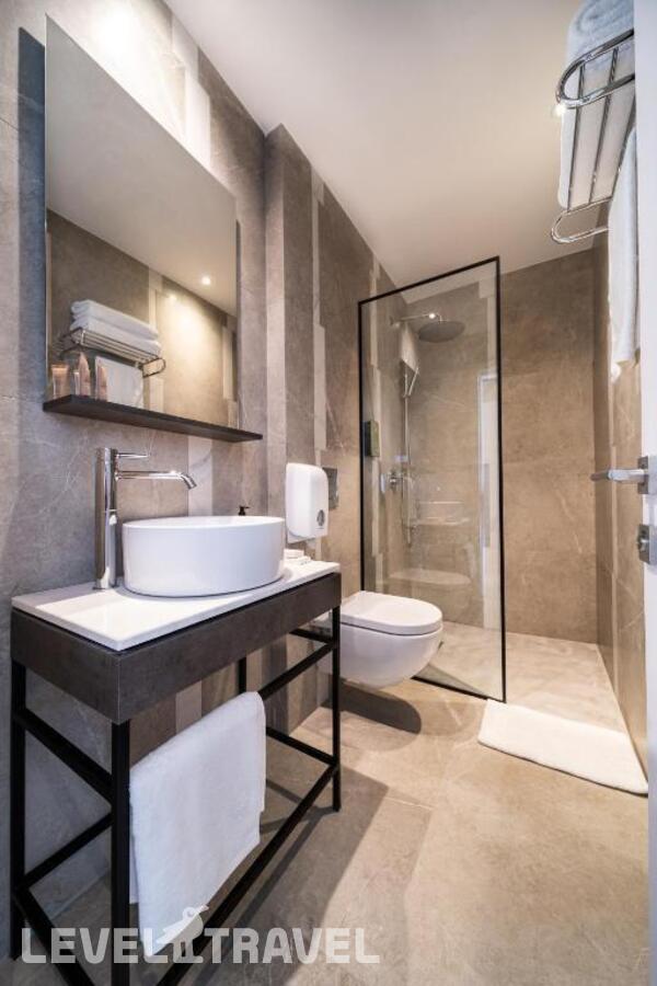фотографии номера Люкс роскошный отеля Alinea Suites Limassol Center в Кипр(Лимасол) - фото №5
