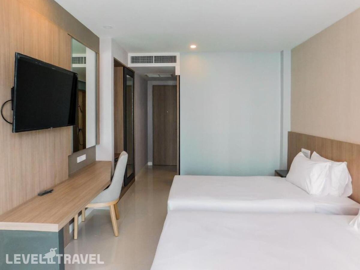 фотографии номера Делюкс (две односпальные кровати) отеля Grace Patong Hotel в Таиланд(Патонг Бич) - фото №1