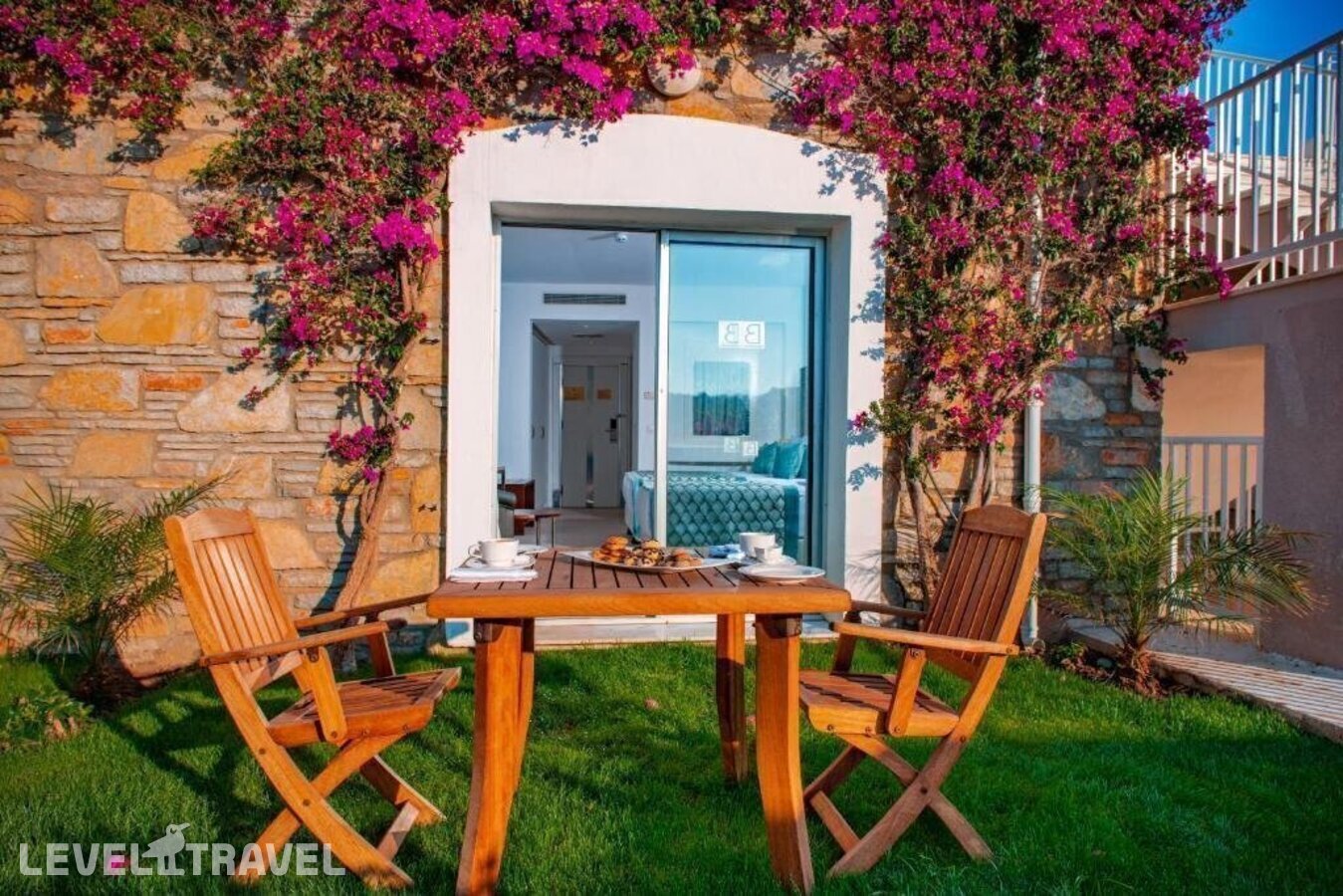 фотографии номера Делюкс с видом на сад отеля Baia Bodrum Hotel в Турция(Гюндоган) - фото №5