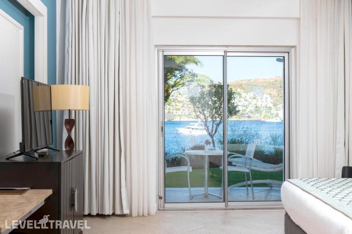 фотографии номера Делюкс с видом на море отеля Baia Bodrum Hotel в Турция(Гюндоган) - фото №18