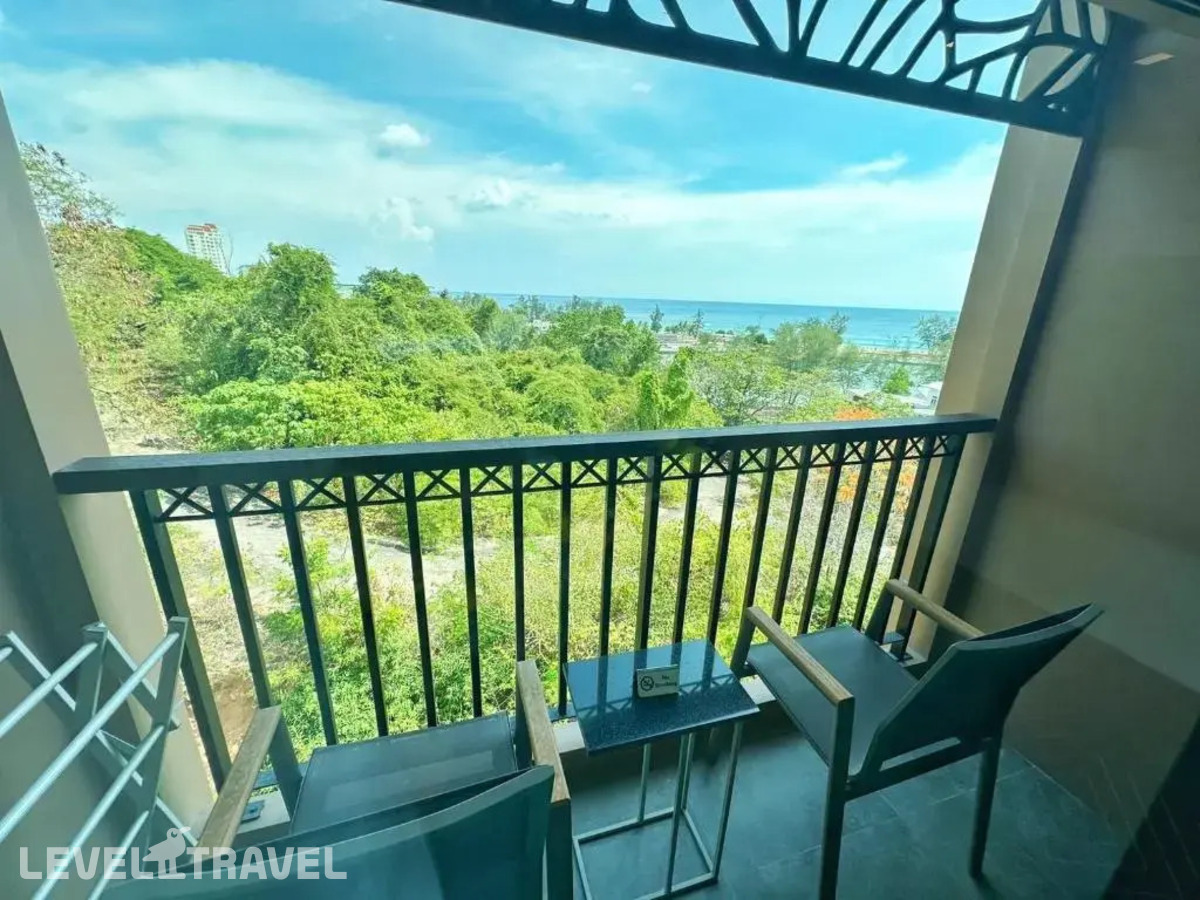 фотографии номера Делюкс (две односпальные кровати) отеля The Proud Karon Beach Phuket Trademark Collection By Wyndham в Таиланд(Карон Бич) - фото №13