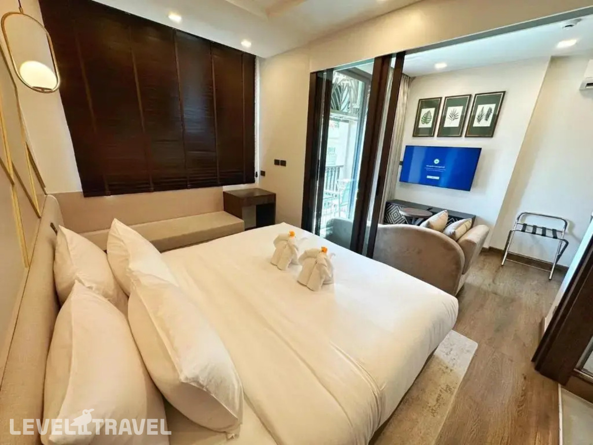 фотографии номера Номер Премьер отеля The Proud Karon Beach Phuket Trademark Collection By Wyndham в Таиланд(Карон Бич) - фото №1