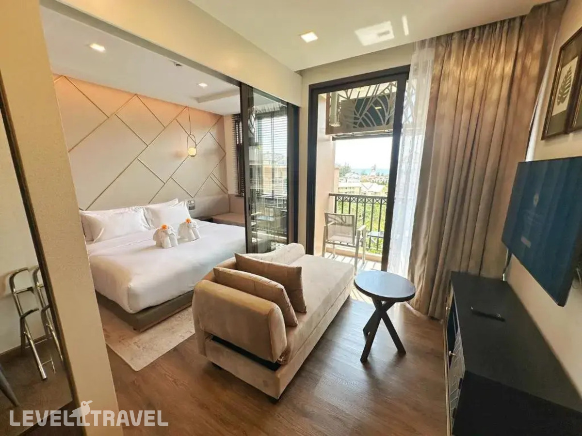 фотографии номера Номер Премьер отеля The Proud Karon Beach Phuket Trademark Collection By Wyndham в Таиланд(Карон Бич) - фото №12