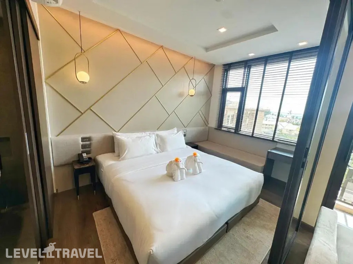 фотографии номера Номер Премьер отеля The Proud Karon Beach Phuket Trademark Collection By Wyndham в Таиланд(Карон Бич) - фото №4