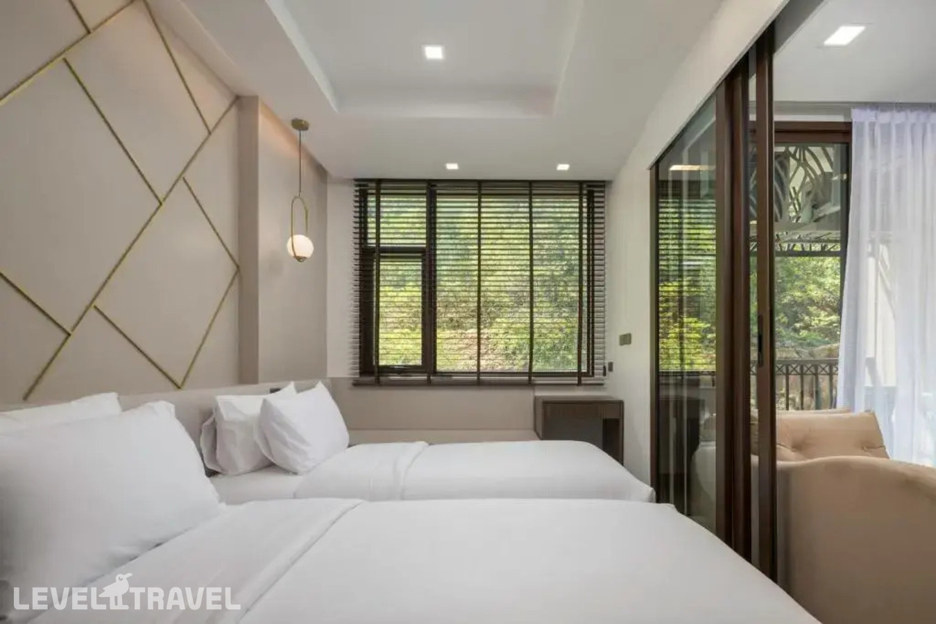 фотографии номера Премьер (две односпальные кровати) отеля The Proud Karon Beach Phuket Trademark Collection By Wyndham в Таиланд(Карон Бич) - фото №3