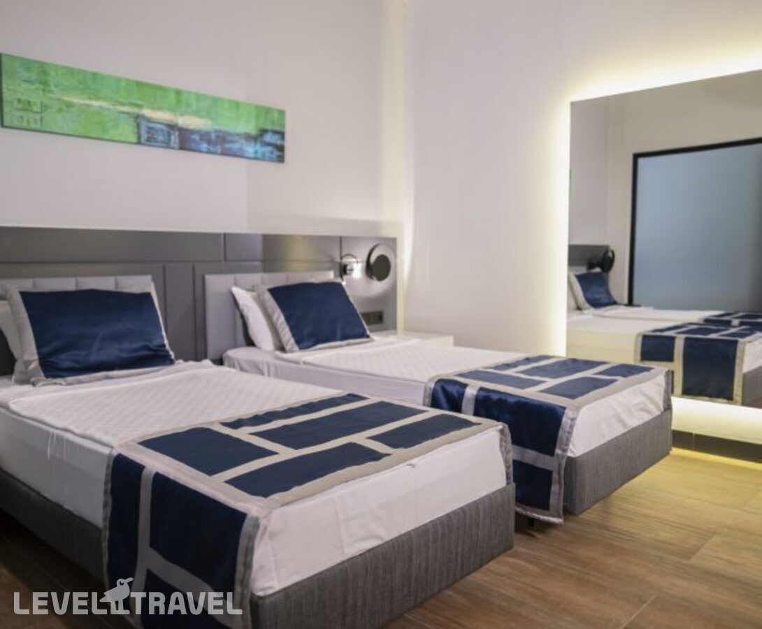 фотографии номера Семейный номер отеля Noxinn Deluxe Hotel в Турция(Конаклы) - фото №1