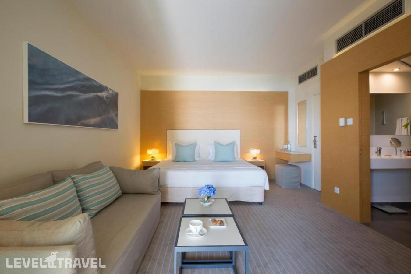 фотографии номера Делюкс с частичным видом на море отеля Capo Bay Hotel в Кипр(Фиг Три Бэй) - фото №2